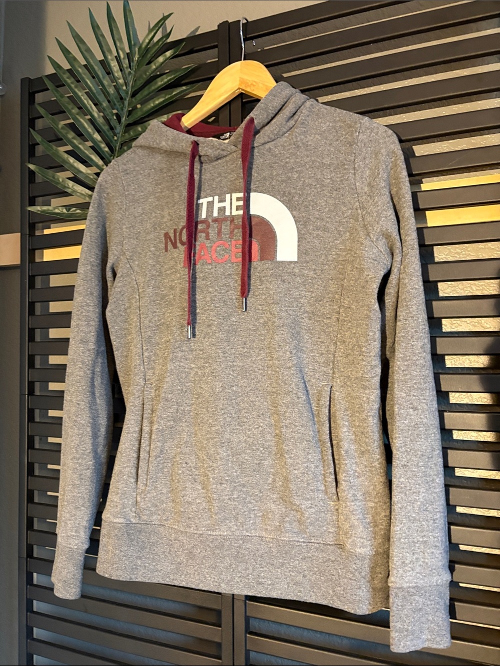 The North Face Gray Crewneck Sweatshirt with Maroon Drawstrings